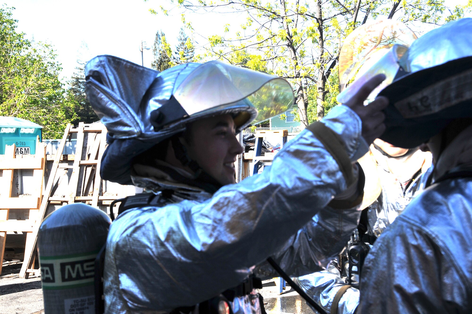TRAVIS AIR FORCE BASE, Calif. -- Firefighters from Team Travis and Team Beale partnered with firefighters from several local communities, to conduct training at two off-base sites April 5 and 6. Twenty-five Airmen from the 349th and six from the 60th Civil Engineer Squadrons, joined nearly 30 Airmen from the 940th and 9th CES and firefighters from the cities of Vacaville, Fairfield, Dixon, Winters, Suisun City and Benicia, for training to gain additional hands-on experience, and reinforce connections within the neighboring groups. (U.S. Air Force photos / Staff Sgt. Cindy Alejandrez) 