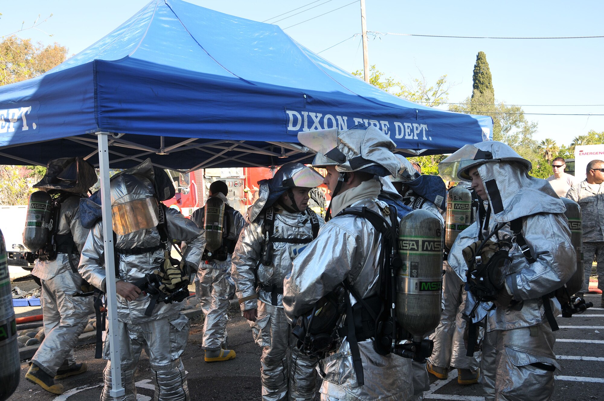 TRAVIS AIR FORCE BASE, Calif. -- Firefighters from Team Travis and Team Beale partnered with firefighters from several local communities, to conduct training at two off-base sites April 5 and 6. Twenty-five Airmen from the 349th and six from the 60th Civil Engineer Squadrons, joined nearly 30 Airmen from the 940th and 9th CES and firefighters from the cities of Vacaville, Fairfield, Dixon, Winters, Suisun City and Benicia, for training to gain additional hands-on experience, and reinforce connections within the neighboring groups. (U.S. Air Force photos / Staff Sgt. Cindy Alejandrez) 