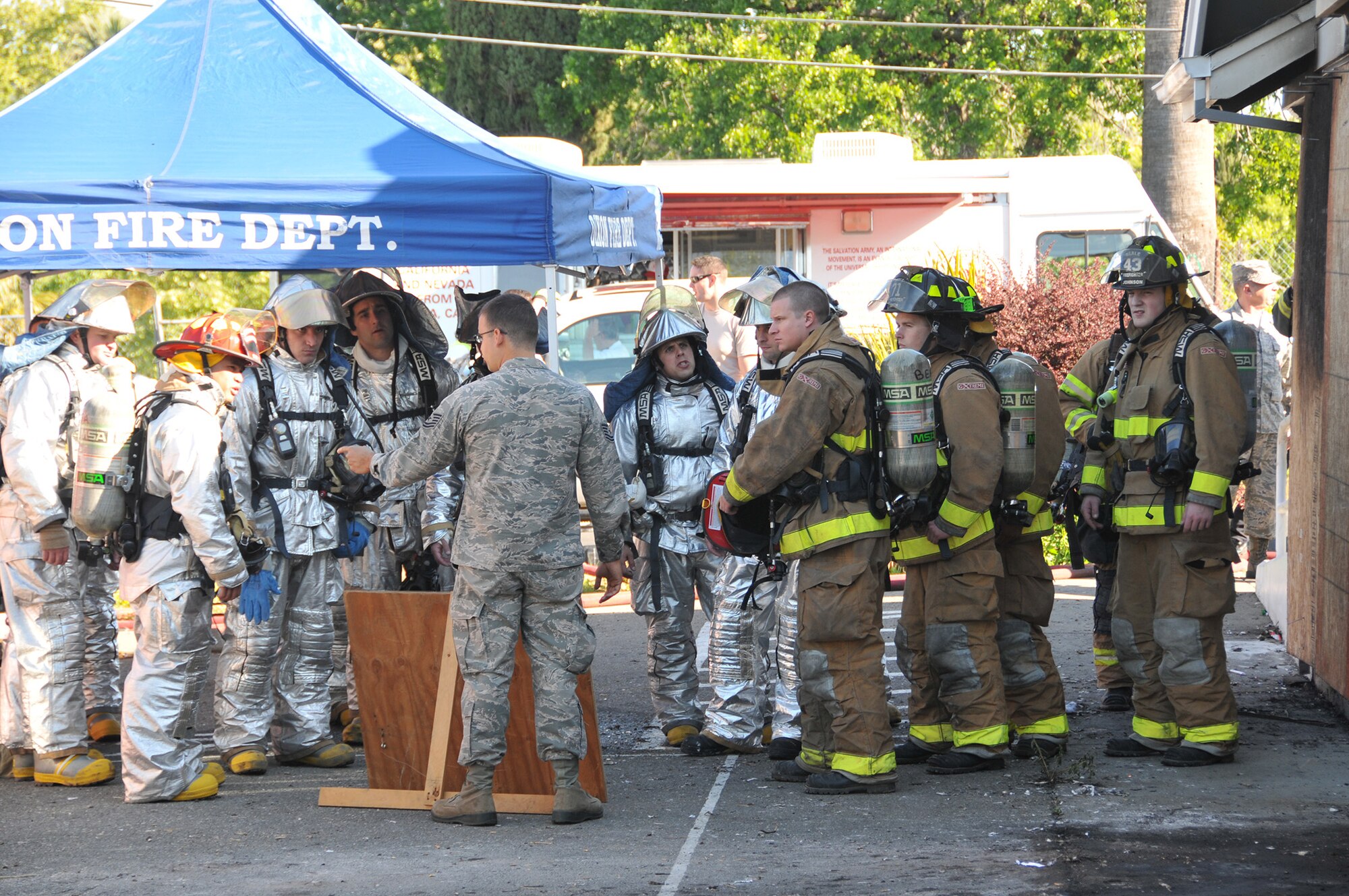 TRAVIS AIR FORCE BASE, Calif. -- Firefighters from Team Travis and Team Beale partnered with firefighters from several local communities, to conduct training at two off-base sites April 5 and 6. Twenty-five Airmen from the 349th and six from the 60th Civil Engineer Squadrons, joined nearly 30 Airmen from the 940th and 9th CES and firefighters from the cities of Vacaville, Fairfield, Dixon, Winters, Suisun City and Benicia, for training to gain additional hands-on experience, and reinforce connections within the neighboring groups. (U.S. Air Force photos / Staff Sgt. Cindy Alejandrez) 