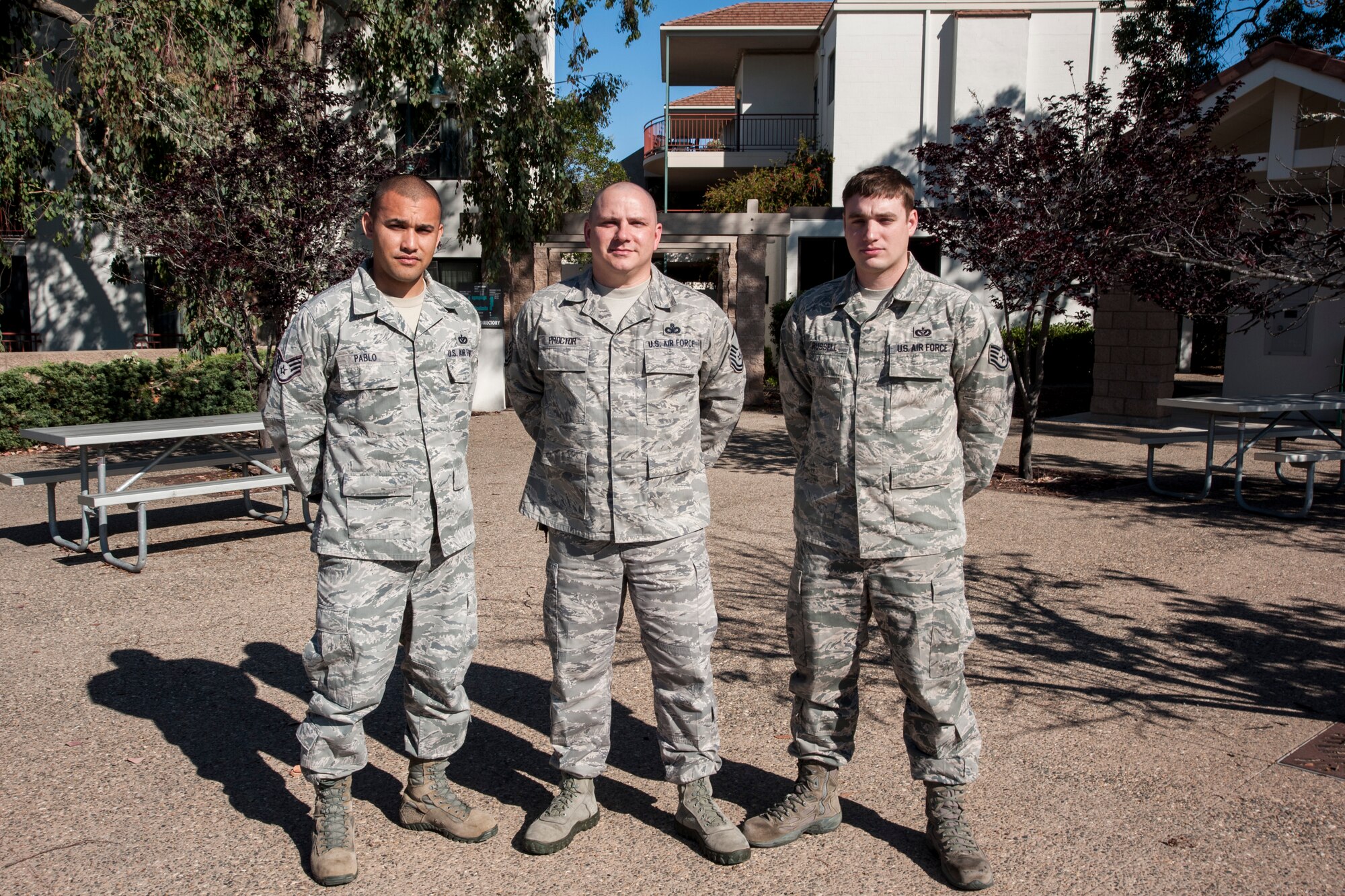 (From left) Staff Sgt. Jarrett Pablo, 30th Civil Engineer Squadron airmen dormitory leader, Master Sgt. William Proctor, 30th CES unaccompanied housing superintendent, and Staff Sgt. Lance Russell, 30th CES airmen dormitory leader, pose for a group photo April 9, 2014, Vandenberg Air Force Base, Calif.  The ADLs strive to provide a modern, functional, well-maintained and comfortable home, as well as promote pride, professionalism and personal dignity. (U.S. Air Force photo/Airman 1st Class Yvonne Morales)
