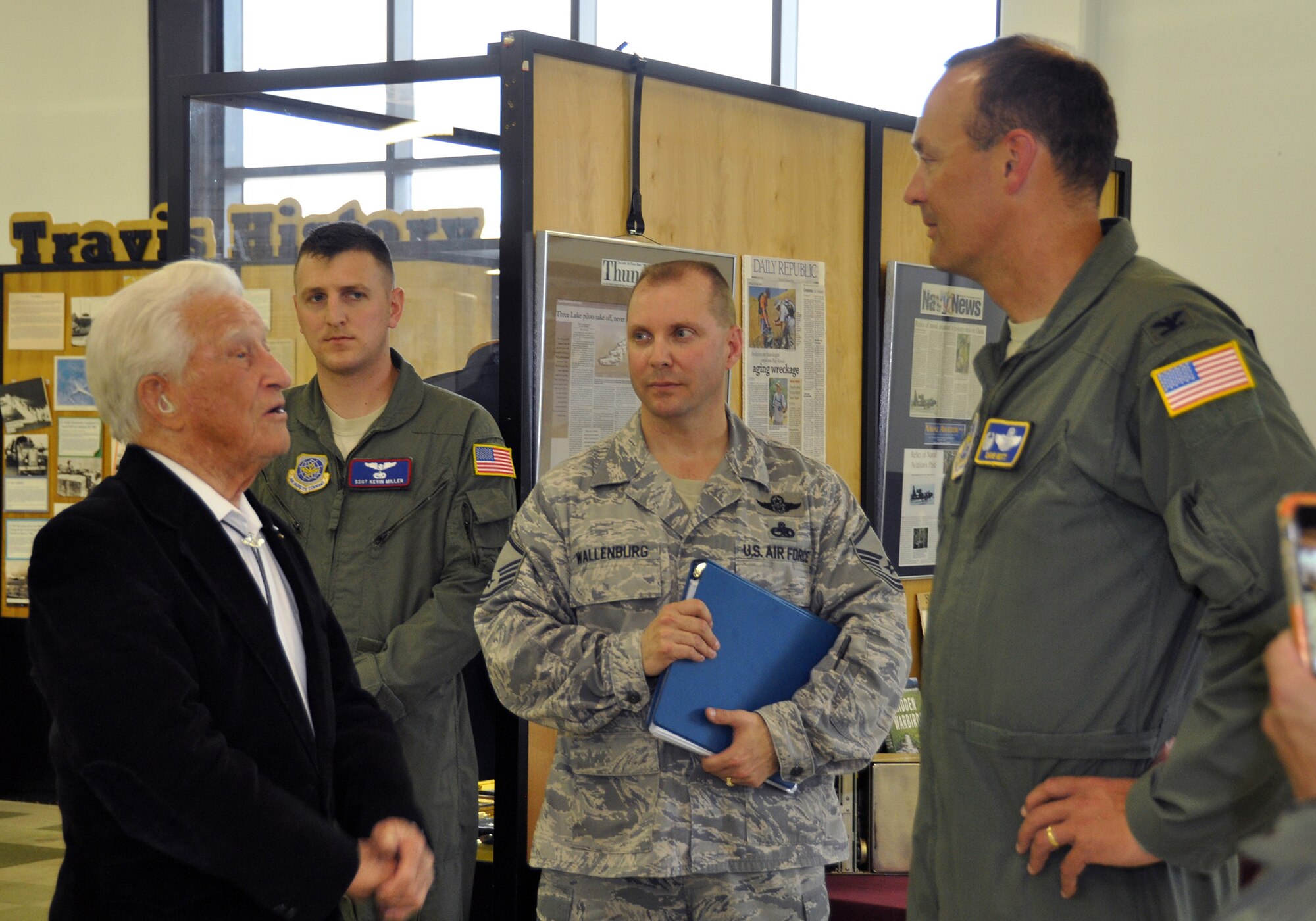 TRAVIS AIR FORCE BASE, Calif. -- Members of the 70th and 79th Air Refueling Squadrons presented Bruce Sooy with a B-25 windshield at the Travis Air Force Base Heritage Center, April 8, 2014. (U.S. Air Force photo/Staff Sgt. Cindy G. Alejandrez)