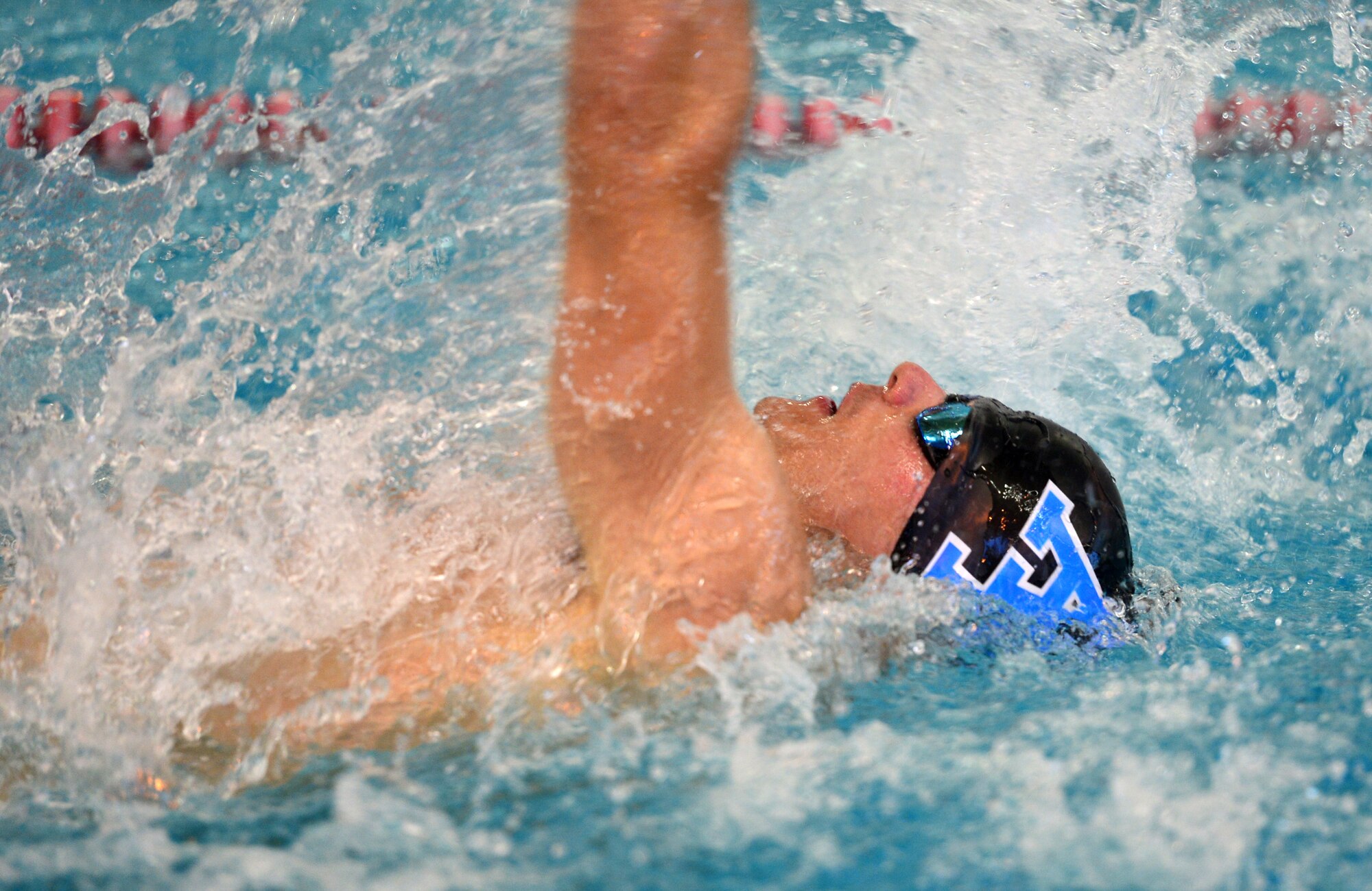 (Ret.) Staff Sgt. Tim Babb, swims during a race between wounded warriors and staff during the Wounded Warrior Team Trials April 7, 2014. Babb finished first in the men's 100-meter race. (U.S. Air Force photo by Staff Sgt. Nadine Barclay)
