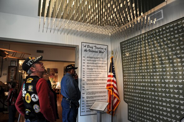 Vietnam veterans and visitors to the Jacksonville Museum of Military History view 'From Arkansas, to the Silver Fields of Vietnam' memorial displayed at the museum, April 5, 2014,in Jacksonville, Ark. The display was one of several Vietnam era displays set up during the Welcome Home Vietnam Veterans Day celebration. (U.S. Air Force photo by Staff Sgt. Jessica Condit)Mobility Command’s standard. (U.S. Air Force photo by Staff Sgt. Caleb Pierce) 