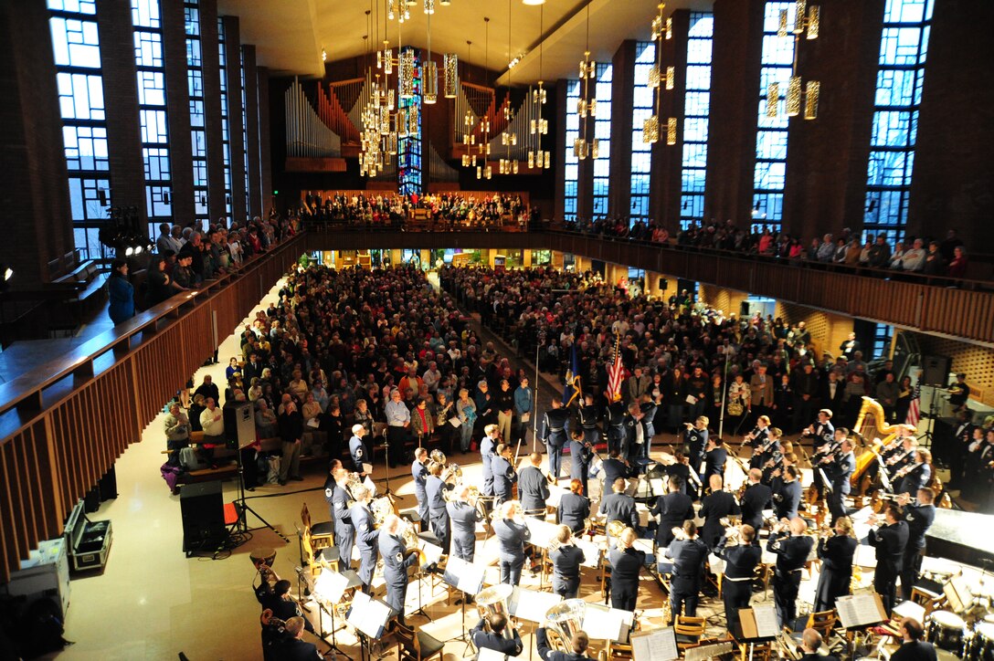The audience stands for a “Stars and Stripes” performance by The U. S. Air Force Band Valparaiso University’s Chapel of Resurrection in Valparaiso, Ind., April 7, 2014. This performance is part of the Band’s 2014 Spring Tour around the Midwest. (U. S. Air Force photo/Airman 1st Class Joshua R. M. Dewberry)