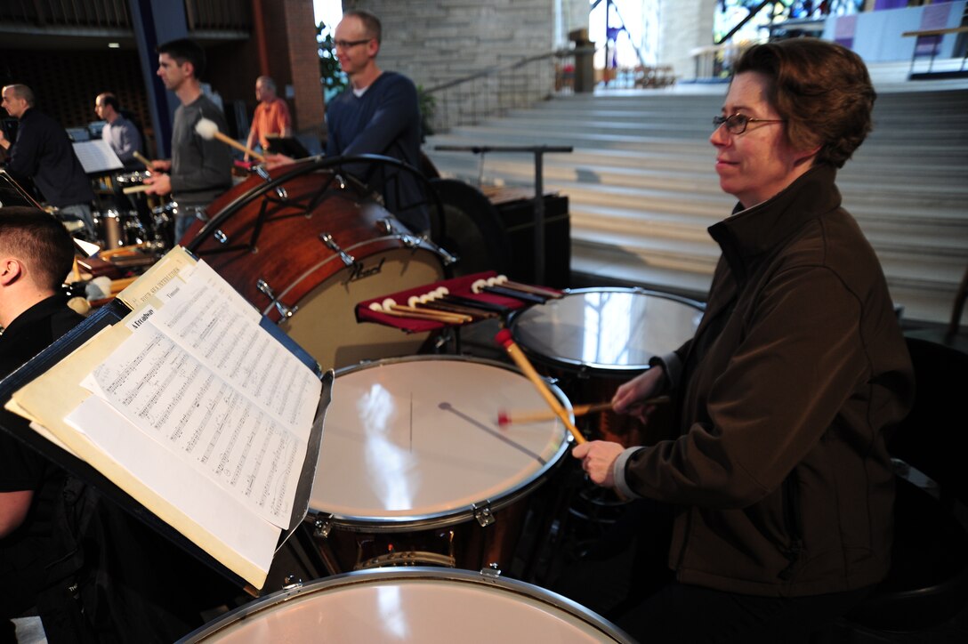 Senior Master Sgt. Erica Montgomery, U.S. Air Force Band timpanist, rehearses for a concert performance at Valparaiso University’s Chapel of Resurrection in Valparaiso, Ind., April 7, 2014. This performance is part of the Band’s 2014 Spring Tour around the Midwest. Montgomery is the only timpanist on this tour and one of several members of the percussion section. (U. S. Air Force photo/Airman 1st Class Joshua R. M. Dewberry)
