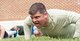 Tech. Sgt. Daniel Waugh, Headquarter Air Combat Command/A3FC, TACP/ Air Support Operations Center (ASOC) Branch TACP training program manager and USAF TACP association board member completes a set of push-ups during the end the U.S. Air Force TACP Association 24-hour runchallenge with the all the runners and volunteers. (U.S. Air Force photo/Sachel S. Seabrook)