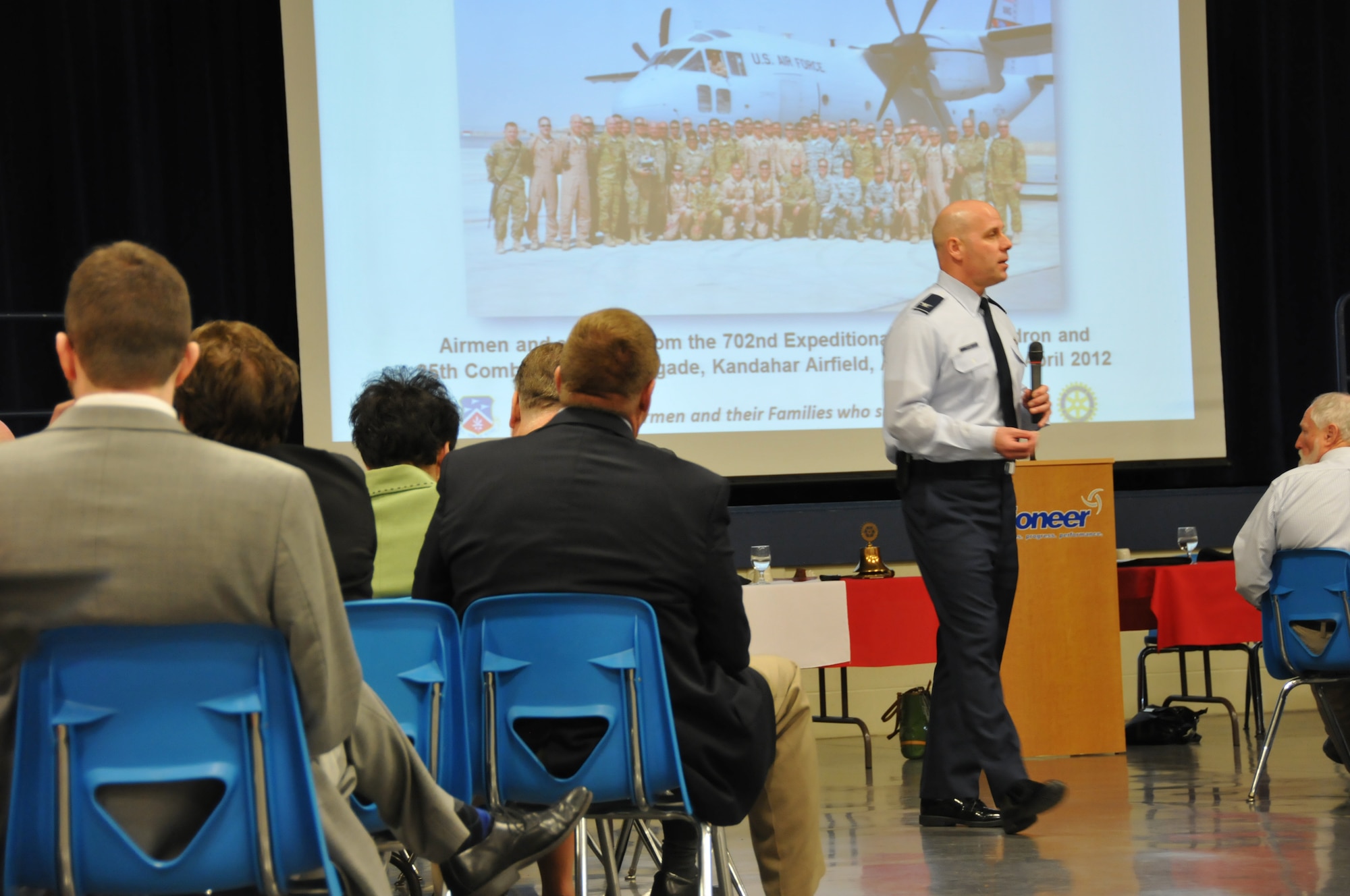 Members of the 179th Airlift Wing from Shelby were honored by the Shelby Rotary Club at Pioneer Career & Technology Center, April 7, 2014, Shelby, OH. Wing Commander, Col. Gary McCue speaks highly of the members from Shelby and talked about the important role of the Shelby community support. Shelby Rotary Club President, Lynn Friebel and Shelby Mayor, Marilyn John, joined Col. McCue in speaking to the group. (U.S. Air National Guard Photo by TSgt Joseph Harwood \Released)