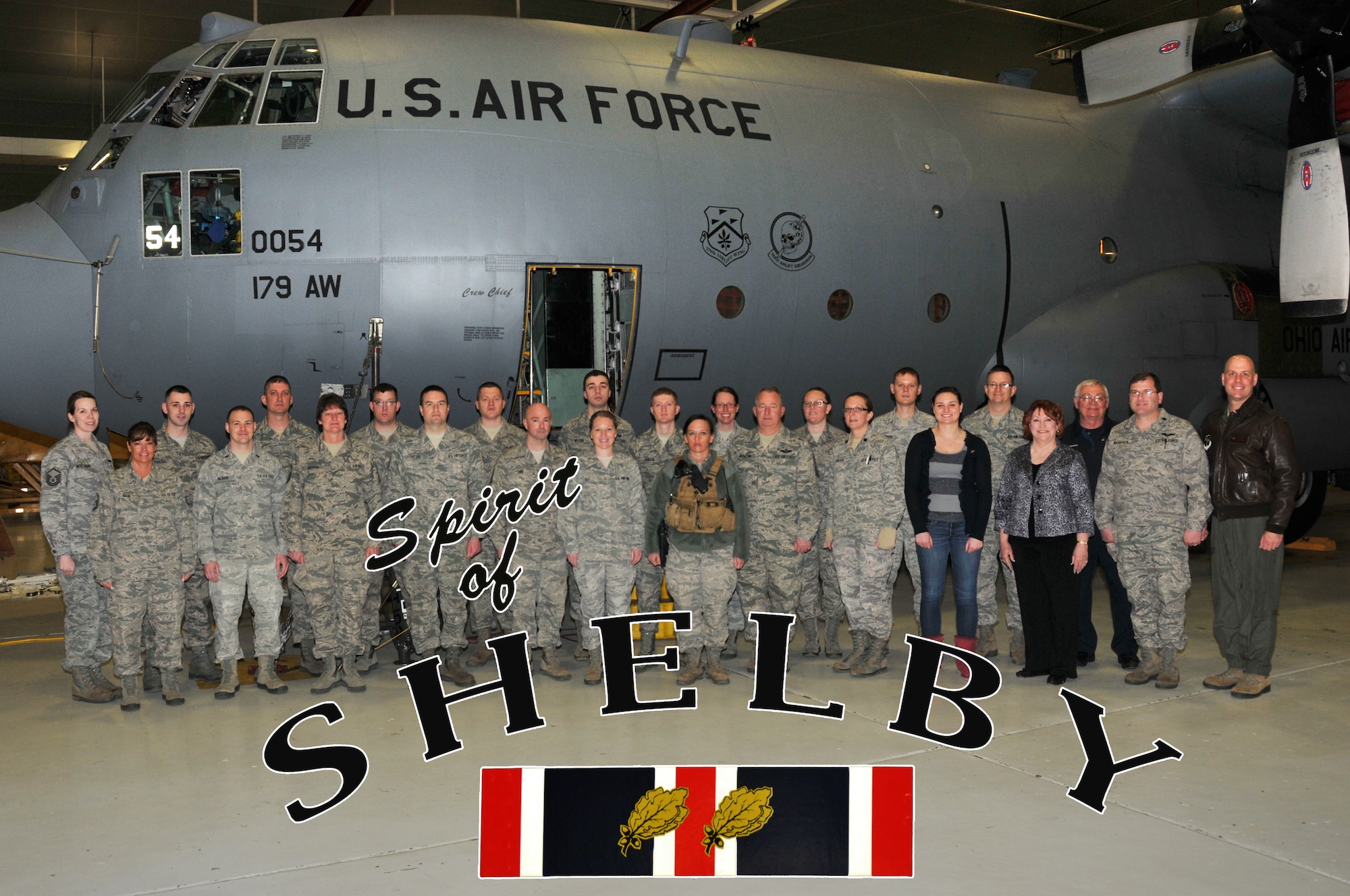 Members of the 179th Airlift Wing from Shelby were honored by the Shelby Rotary Club at Pioneer Career & Technology Center, April 7, 2014, Shelby, OH. Wing Commander, Col. Gary McCue speaks highly of the members from Shelby and talked about the important role of the Shelby community support. Shelby Rotary Club President, Lynn Friebel and Shelby Mayor, Marilyn John, joined Col. McCue in speaking to the group. (U.S. Air National Guard Photo by TSgt Joseph Harwood \Released)