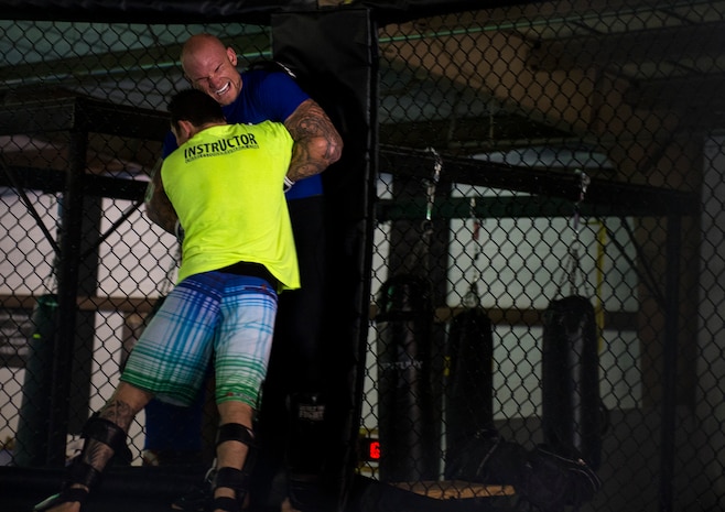 Nate Kiser catches his breath after a sparring session at Charleston Krav Maga and Mixed Martial Arts, March 28, 2014. Kiser was training five to six days a week for an upcoming competition in Charlotte, N.C. (U.S. Air Force photo/Senior Airman Kenneth Norman)