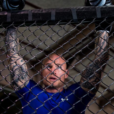 Nate Kiser catches his breath after a sparring session at Charleston Krav Maga and Mixed Martial Arts, March 28, 2014. Kiser was training five to six days a week for an upcoming competition in Charlotte, N.C. (U.S. Air Force photo/Senior Airman Kenneth Norman)