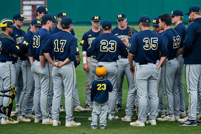 University of Michigan head coach Erik Bakich, talks to his team before a game at the College of Charleston Tournament March 15, 2014, in Charleston, S.C. The University of Michigan played the College of Charleston and would go on to lose both games of a double header. (U.S. Air Force photo/Senior Airman James Richardson)