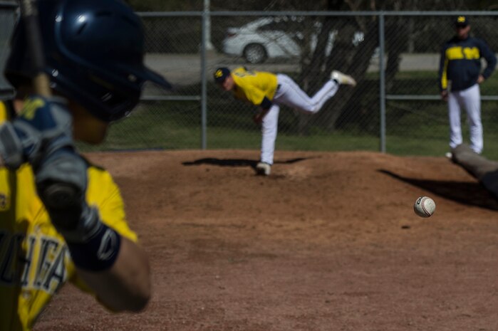 University of Michigan pitcher Trent Szkutnik, warms-up in the bullpen before starting against Appalachian State University at the College of Charleston Tournament  March 14, 2014, in Charleston, S.C.  The University of Michigan would go on to win the game 4-3. (U.S. Air Force photo/Senior Airman James Richardson)