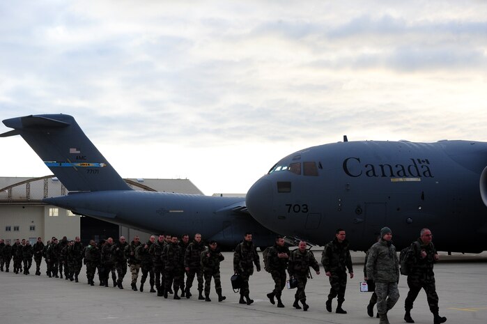French soldiers march to a U.S. Air Force C-17 Globemaster III during Operation Serval as France increases their presence in the Republic of Mali to fight Islamic extremists Jan. 20, 2013. (U.S. Air Force photo/Senior Airman James Richardson)