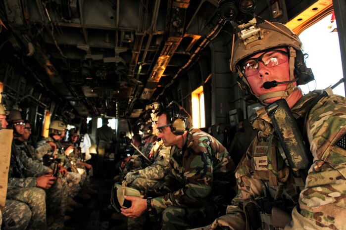 82nd Expeditionary Rescue Squadron pararescuemen, and members of the U.S. Army 2nd Battalion, 138th Field Artillery Regiment Sight Security team, participate in a training exercise Nov. 28, 2012, in the Grand Bara Desert, Djibouti. The 82nd ERQS was conducting training exercises in support of Combined Joint Task Force - Horn of Africa. (U.S. Air Force photo/by Airman 1st Class Nicholas Byers)