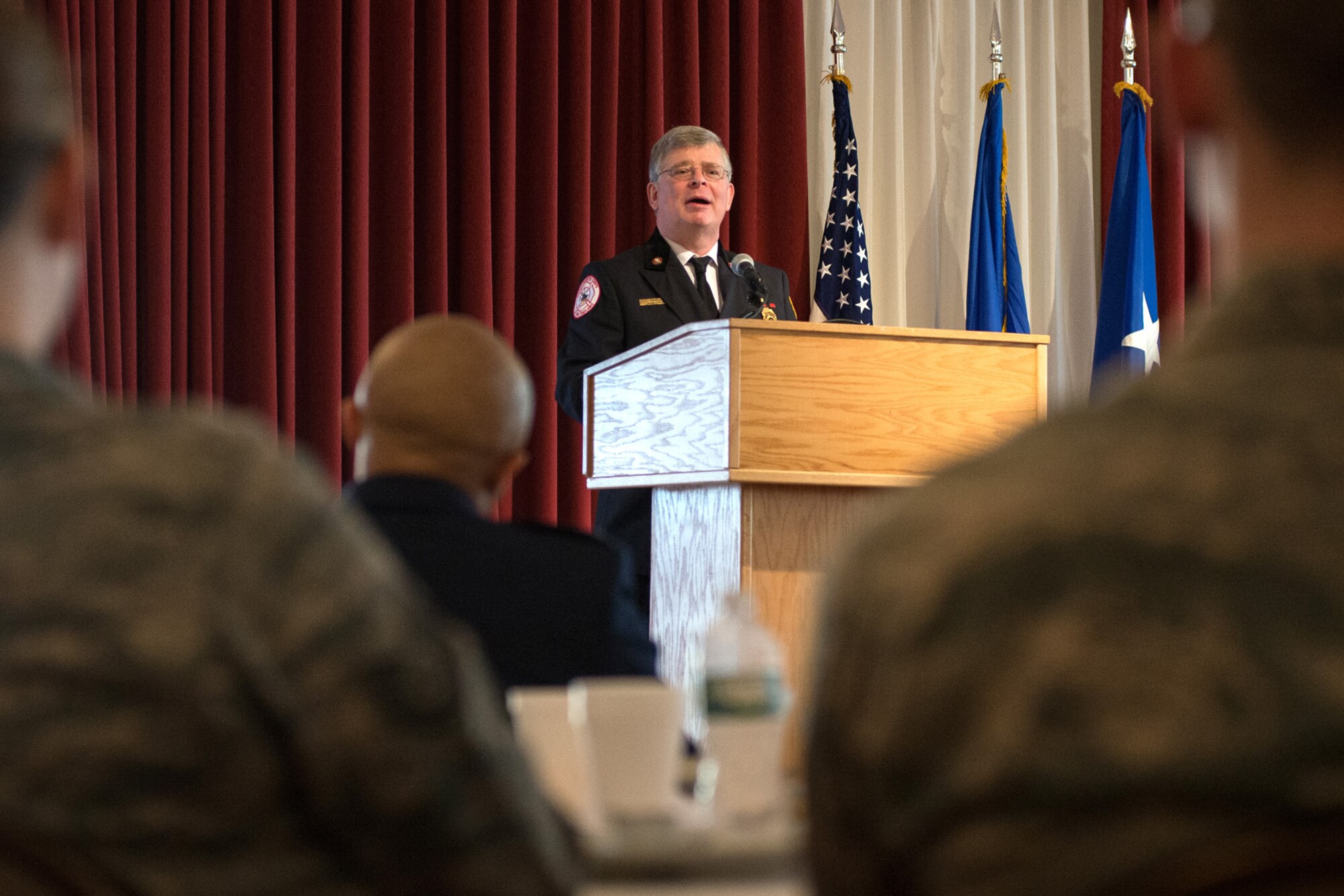 HANSCOM AIR FORCE BASE, Mass. – The Rev. James A. Tilbe, Chaplain of the Mass. Corps of Fire Chaplains chief chaplain, speaks to members of the Hanscom community attending the Hanscom National Prayer Breakfast at the Minuteman Commons April 4. Tilbe's theme for his address was, "Finishing the Race: Faith to Overcome Adversity." (U.S. Air Force photo by Mark Herlihy)