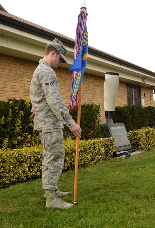 U.S. Air Force Airman 1st Class Zachary Sellers, 7th Special Operations Squadron, bows his head March 28, 2014, during a remembrance ceremony on RAF Mildenhall, England. The ceremony was held in honor of the 9th anniversary of the nine Airmen who died when WRATH-11, their MC-130H Combat Talon II assigned to the 7th SOS, crashed in Albania in 2005. (U.S. Air Force photo by Airman 1st Class Jonathan Light/Released)