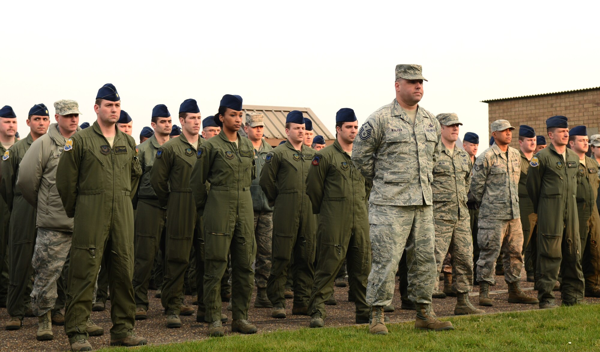 U.S. Air Force Master Sgt. Stephen Walker, 7th Special Operations Squadron first sergeant, leads a formation of 7th SOS members March 28, 2014, during a remembrance ceremony on RAF Mildenhall, England. The ceremony was held in honor of the 9th anniversary of the nine Airmen who died when WRATH-11, an MC-130H Combat Talon II assigned to the 7th SOS, crashed in Albania in 2005. The flight was part of a training exercise with two other aircraft to train on low-level and low-light flying. (U.S. Air Force photo by Airman 1st Class Jonathan Light/Released)