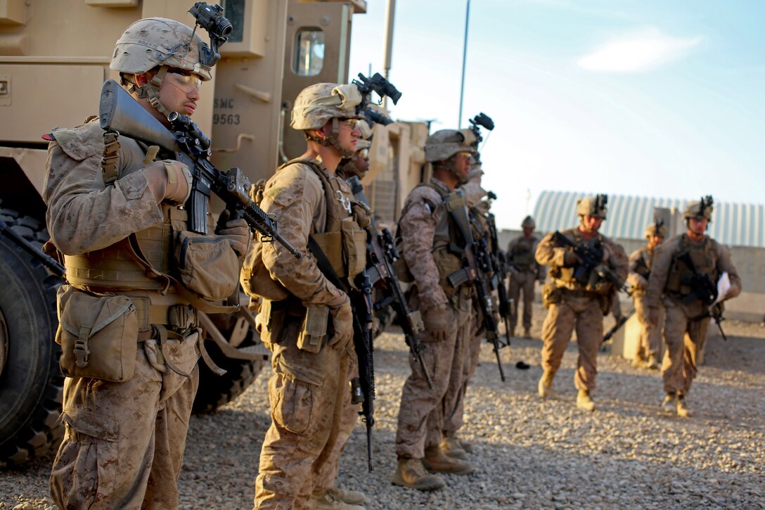 U.S. Marines prepare for a quick reaction force drill on Camp ...