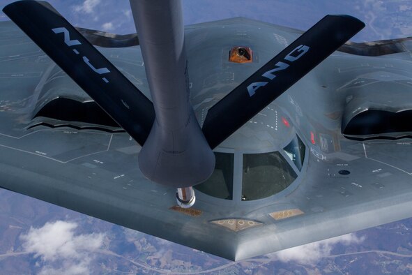A B-2 Spirit approaches the refueling boom of a KC-135 Stratotanker, April 2, 2014, over New Jersey. Air Force ROTC cadets observed the refueling as part of an orientation flight program. The KC-135 is assigned to the 108th Wing, New Jersey Air National Guard. The B-2 is assigned to the 509th Bomb Wing, Whiteman Air Force Base, Mo. (U.S. Air National Guard photo/Master Sgt. Mark C. Olsen)