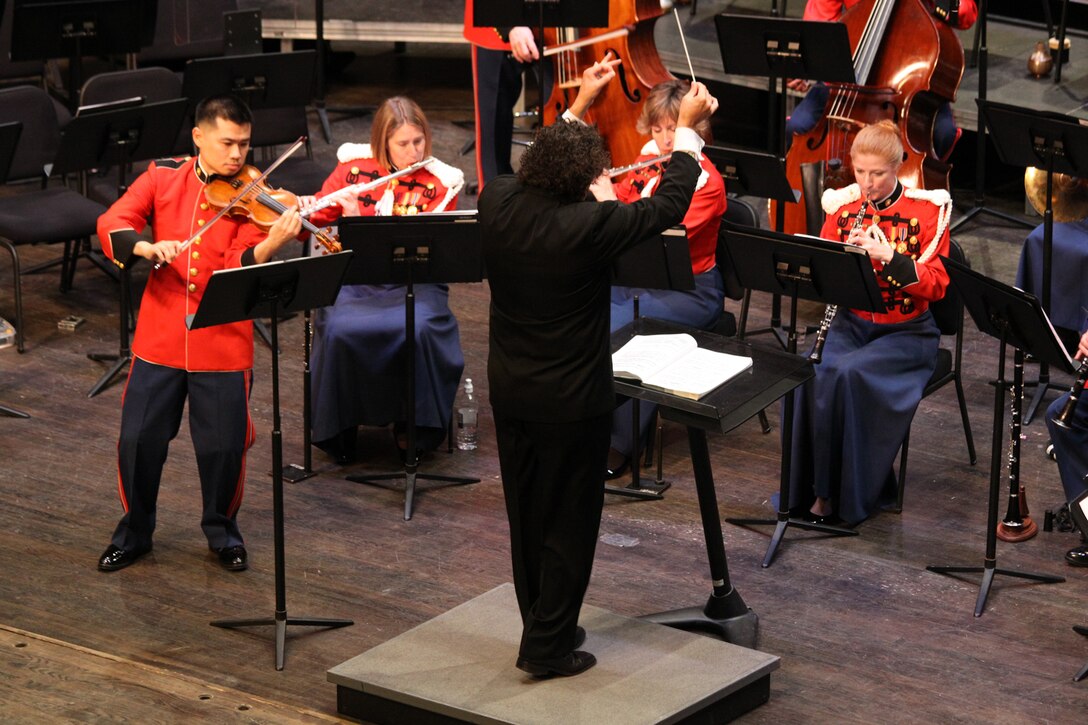 On March 31, 2014 the music director of the Nashville Symphony Giancarlo Guerrero guest conducted the Marine Band at the Schlesinger Concert Hall at Northern Virginia Community College in Alexandria, Va. The program included Michael Daugherty's Bells for Stokowski, Kurt Weill's Concerto for Violin and Winds featuring Staff Sgt. Sheng-Tsung Wang, and Igor Stravinsky's Rite of Spring. (U.S. Marine Corps photo by Master Sgt. Kristin duBois/released)