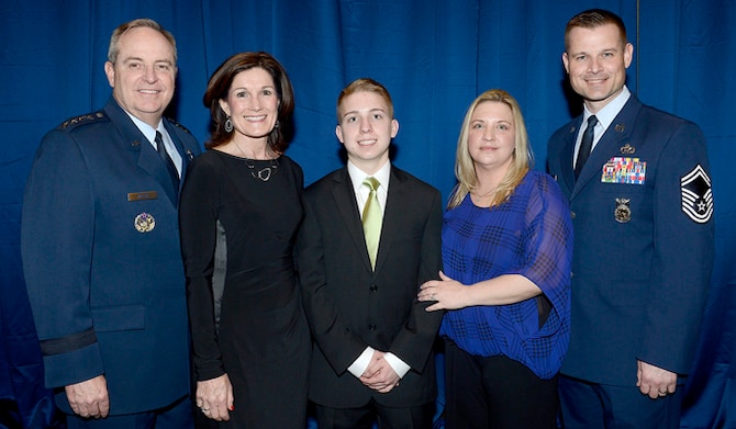 Air Force Chief of Staff Gen. Mark A. Welsh III (left) and his wife, Betty, congratulate Gage Dabin, the Air Force recipient of the Military Child of the Year Award during the 6th annual gala hosted by Operation Homefront April 10, 2014, in Arlington, Va. Gage is the son of Senior Master Sgt. Tobias Adam and mother, Jennifer. The family is currently stationed at Joint Base Elmendorf-Richardson, Alaska. (U.S. Air Force photo/Scott M. Ash)