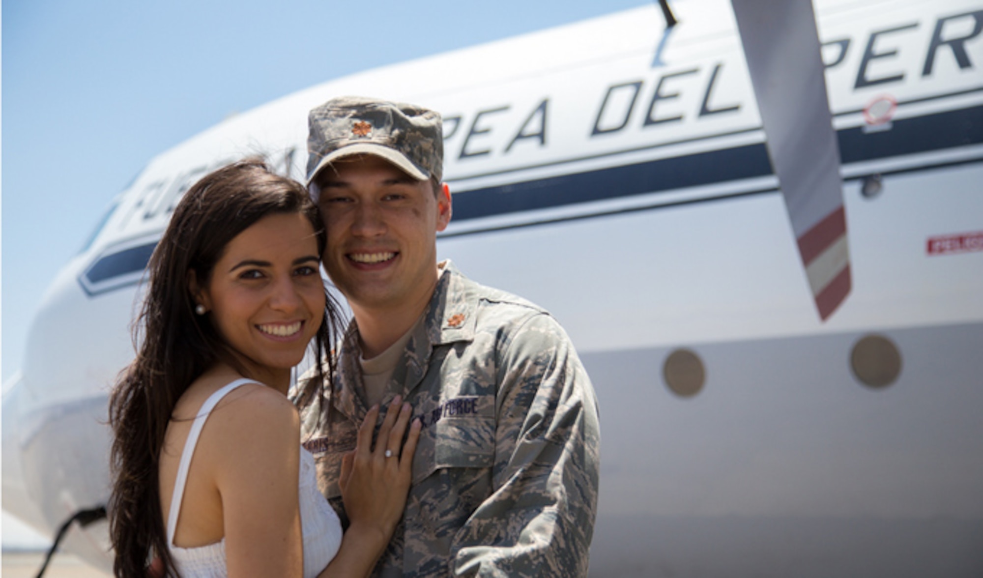 Maj. Paul Morris hugs his fiancée Sarah Rebeca Vieira de Azevedo Ribeiro on the flightline in Lima, Peru. Morris was an international exchange officer embedded with the Peruvian air forces. (Courtesy photo/Katie Leon Photography)