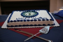 A cake is presented to show appreciation to the volunteers at the Navy-Marine Corps Relief Society's annual Volunteer Awards and Recognition Ceremony at the Officers Club aboard Marine Corps Air Station New River, April 7. The volunteers were presented with different awards based on how many hours they had volunteered. (U.S. Marine Corps photo by Lance Cpl. Andy J. Orozco/Released)


