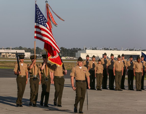 Sgt. Robert A. Allen III, commander of troops and motor transportation specialist with Marine Wing Support Squadron 272, marches the color guard to retire the colors during the Marine Corps Air Station New River relief and appointment and retirement ceremony for Sgt. Maj. Robert A. Allen Jr. (outgoing) and Sgt. Maj. William H. Oldenburg aboard the air station, April 11. Allen relinquished his post as the air station sergeant major to Oldenburg. During the ceremony, noncommissioned officers held key billets during the ceremony and marched with the noncommissioned officer sword. Sgt. Allen is the son of Sgt. Maj. Allen. 