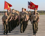 Marines from Marine Corps Air Station New River march the pass and review portion of the relief and appointment and retirement ceremony for Sgt. Maj. Robert A. Allen Jr., outgoing, and Sgt. Maj. William H. Oldenburg (incoming), April 11. Allen relinquished his post as the air station sergeant major to Oldenburg. During the ceremony, noncommissioned officers held key billets during the ceremony and marched with the noncommissioned officer sword. Sgt. Maj. Allen’s son, Sgt. Robert A. Allen III, a motor transportation specialist with Marine Wing Support Squadron 272, was the commander of troops for the ceremony.