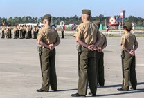 The staff for the Marine Corps Air Station New River relief and appointment and retirement ceremony await the command "fall-in," to commence the ceremony, April 11. Noncommissioned officers held key billets for the ceremony and marched with the NCO sword. Sgt. Maj. Robert A. Allen Jr. relinquished his post as the air station sergeant major to Sgt. Maj. William H. Oldenburg. Allen retired after 30 years of faithful and honorable service. 