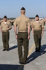 Sergeants Maj. Robert A. Allen Jr., left, and William H. Oldenburg, right, report to Col. Timothy M. Salmon, Marine Corps Air Station New River commanding officer, during a relief and appointment and retirement ceremony held aboard MCAS New River, April 11. Allen relinquished his post as the air station sergeant major to Oldenburg. During the ceremony, noncommissioned officers held key billets during the ceremony and marched with the noncommissioned officer sword. Sgt. Maj. Allen’s son, Sgt. Robert A. Allen III, a motor transportation specialist with Marine Wing Support Squadron 272, was the commander of troops for the ceremony.