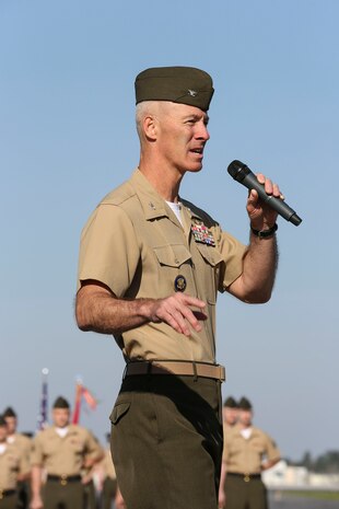 Col. Timothy M. Salmon, Marine Corps Air Station New River commanding officer, speaks about the accomplishments of Sgt. Maj. Robert A. Allen Jr. during a relief and appointment and retirement ceremony, April 11. Allen relinquished his post as the air station sergeant major to Sgt. Maj. William H. Oldenburg. During the ceremony, noncommissioned officers held key billets during the ceremony and marched with the noncommissioned officer sword. Sgt. Maj. Allen’s son, Sgt. Robert A. Allen III, a motor transportation specialist with Marine Wing Support Squadron 272, was the commander of troops for the ceremony. 