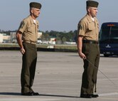 Sgt. Robert A. Allen III, a motor transportation specialist with Marine Wing Support Squadron 272, and Sgt. Maj. Robert Allen Jr.'s son, serves as the commander of troops during the Marine Corps Air Station New River relief and appointment ceremony held aboard the air station April 11. Sgt. Maj. Allen relinquished his post as the air station sergeant major to Sgt. Maj. William H. Oldenburg. During the ceremony, noncommissioned officers held key billets during the ceremony and marched with the noncommissioned officer sword. 