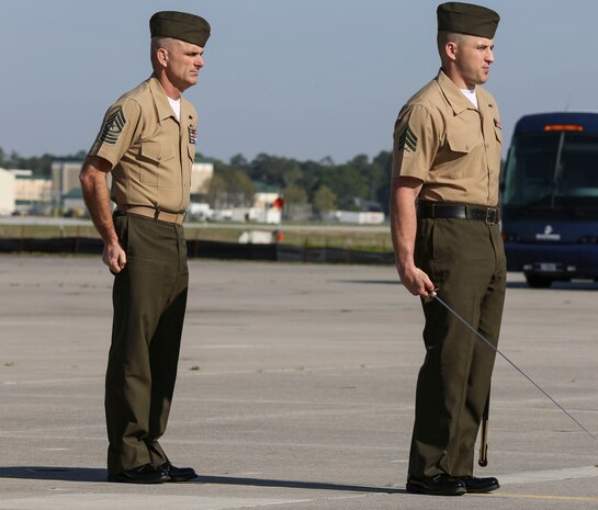 Sgt. Robert A. Allen III, a motor transportation specialist with Marine Wing Support Squadron 272, and Sgt. Maj. Robert Allen Jr.'s son, serves as the commander of troops during the Marine Corps Air Station New River relief and appointment ceremony held aboard the air station April 11. Sgt. Maj. Allen relinquished his post as the air station sergeant major to Sgt. Maj. William H. Oldenburg. During the ceremony, noncommissioned officers held key billets during the ceremony and marched with the noncommissioned officer sword. 