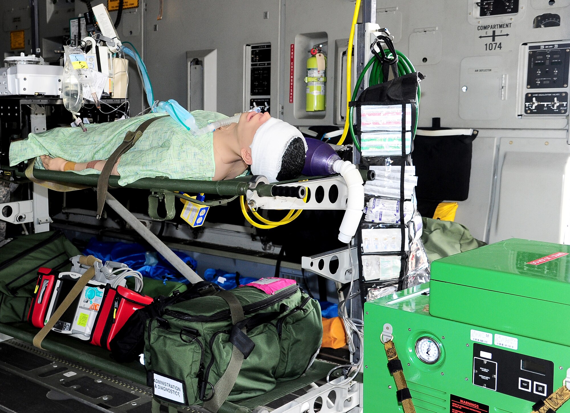 A C-17 from Mississippi Air National Guard, Jackson, Miss. displays the capabilities of a Critical Care Aeromedical Transport team at the 2014 Columbus Air Force Base Open House and Air Show April 5 and 6. The CCAT exhibit at the air show consisted of a critical care physician, a nurse and respiratory therapist from Keesler AFB, Miss. as well as other medical and crew members from Jackson ANG. (U.S. Air Force Photo/Senior Airman Charles Dickens)