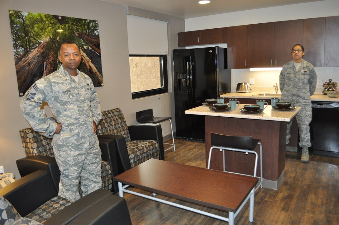 TRAVIS AIR FORCE BASE, Calif. -- Team Travis leadership was on-hand for the ribbon cutting ceremony for the new "Dorms-4-Airmen" opening. (U.S. Air Force photos / Ellen Hatfield)