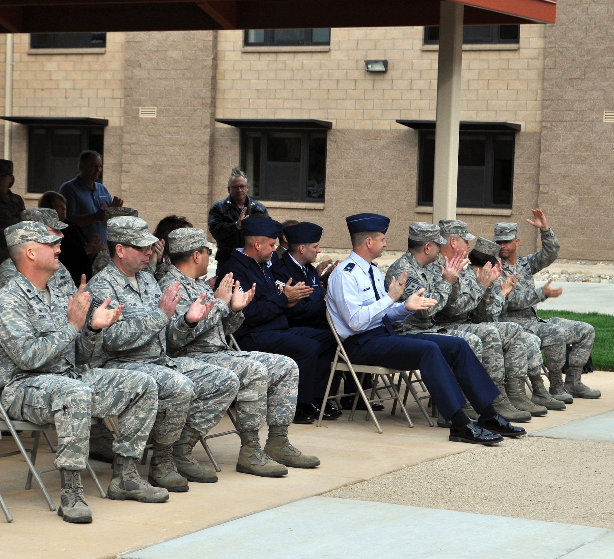 TRAVIS AIR FORCE BASE, Calif. -- Team Travis leadership was on-hand for the ribbon cutting ceremony for the new "Dorms-4-Airmen" opening. (U.S. Air Force photos / Ellen Hatfield)