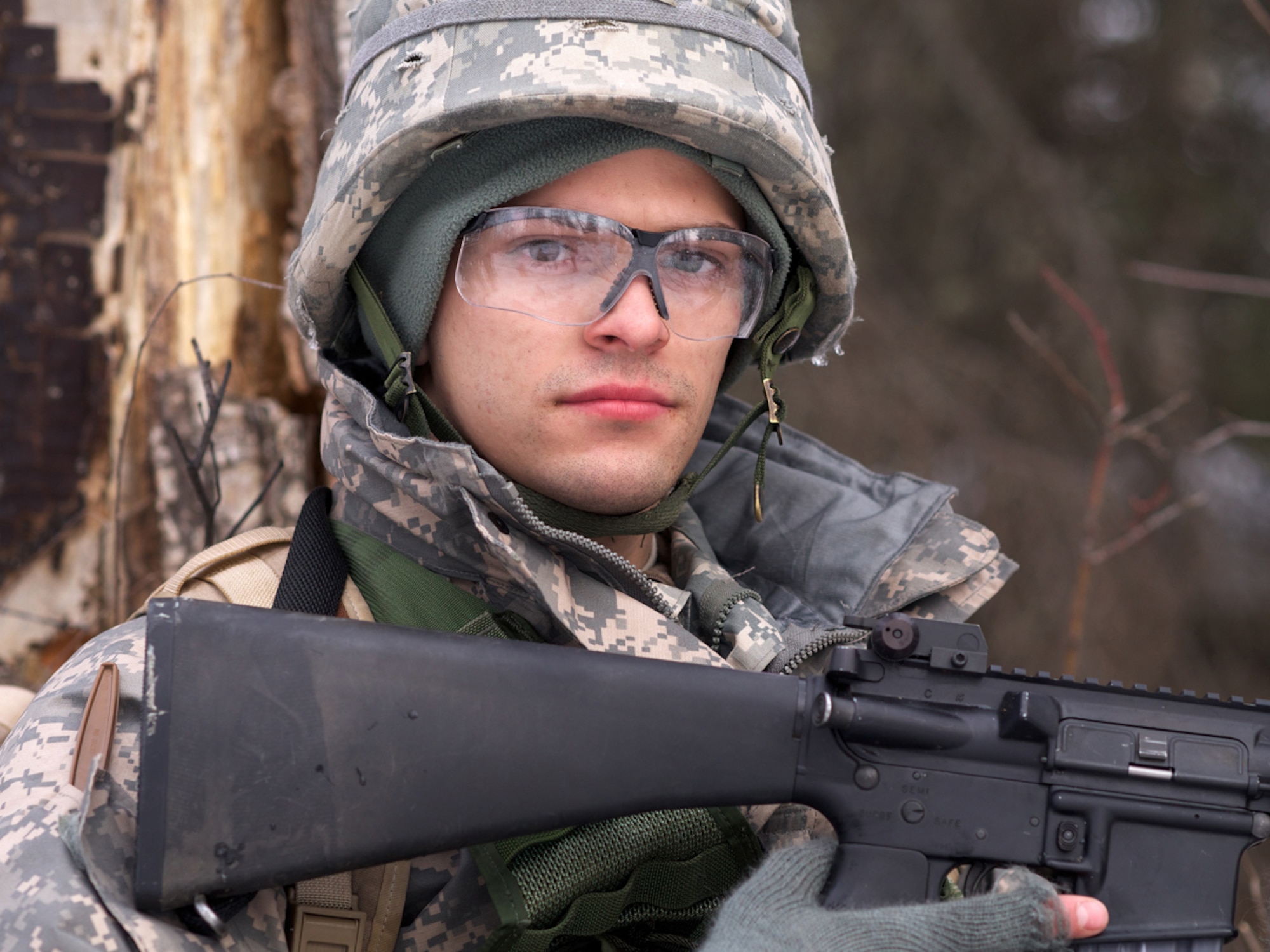 JOINT BASE ELMENDORF-RICHARDSON, Alaska -- Dominick Mariutto, a sophomore Army ROTC cadet at the University of Alaska Fairbanks, takes a short break April 4 during the University of Alaska Anchorage and UAF Joint Field Training Exercise at JBER's Camp Mad Bull. Cadets traveled more than 350 miles by van from UAF to JBER to participate in the FTX. (U.S. Air Force photo/David Bedard)