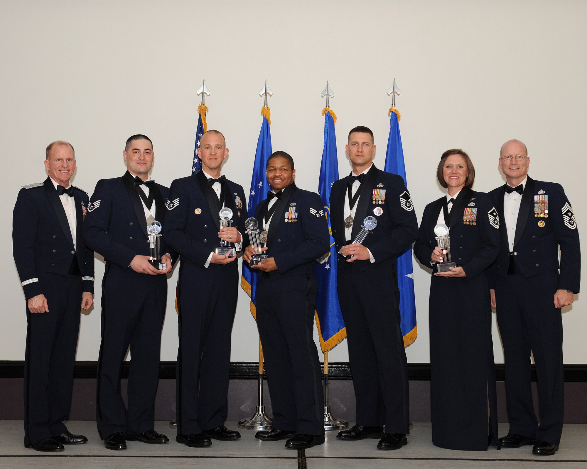 Lt. Gen. Stephen Wilson, commander, Air Force Global Strike Command and Chief Master Sgt. Terry West, command chief AFGSC, stand with the 2013 AFGSC Outstanding Airmen of the Year at Barksdale AFB, La., April 10. (U.S. Air Force photo by Senior Airman Benjamin Gonsier)