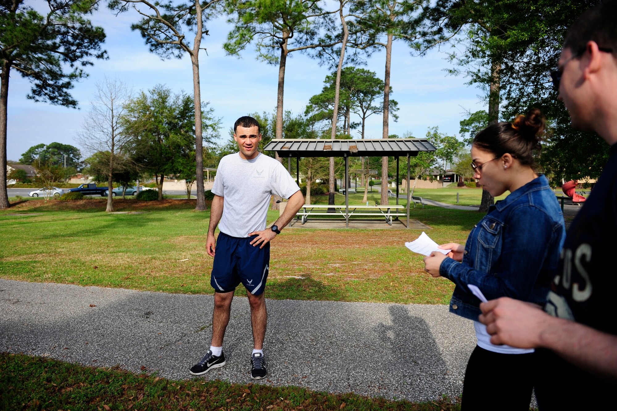 An Airman answers sexual assault questions while his teammates perform exercises during the CLEAR Challenge Obstacle Course on Hurlburt Field Fla., April 11, 2014. The courses represented things one may encounter in their personal and work life. (U.S. Air Force photo/Senior Airman Krystal M. Garrett)