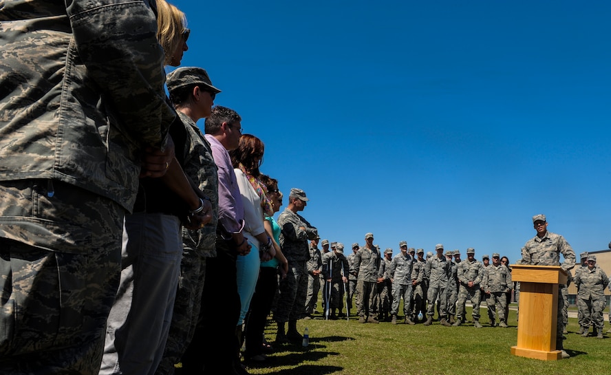 U.S. Air Force Senior Airman Charles Valcarcel, 823d Base Defense Squadron fire team member, shares a personal story during a tree dedication ceremony in honor of Staff Sgt. Todd Lobraico Jr. at Moody Air Force Base, Ga., April 10, 2014. Valcarcel and Lobraico were on the same squad while deployed in 2013. (U.S. Air Force photo by Airman 1st Class Alexis Millican/Released)