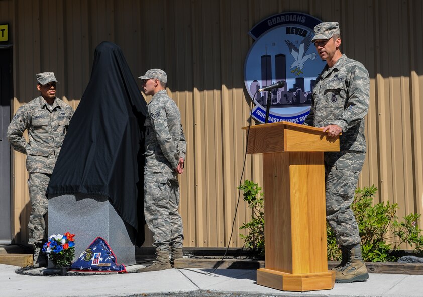 U.S. Air Force Col. Paul Kasuda, 820th Base Defense Group commander gives remarks during a memorial dedication ceremony in honor of Staff Sgt. Todd Lobraico Jr. April 10, 2014, at Moody Air Force Base, Ga. Lobraico deployed twice with Airmen from Moody’s 820th BDG. (U.S. Air Force photo by Airman 1st Class Alexis Millican/Released)