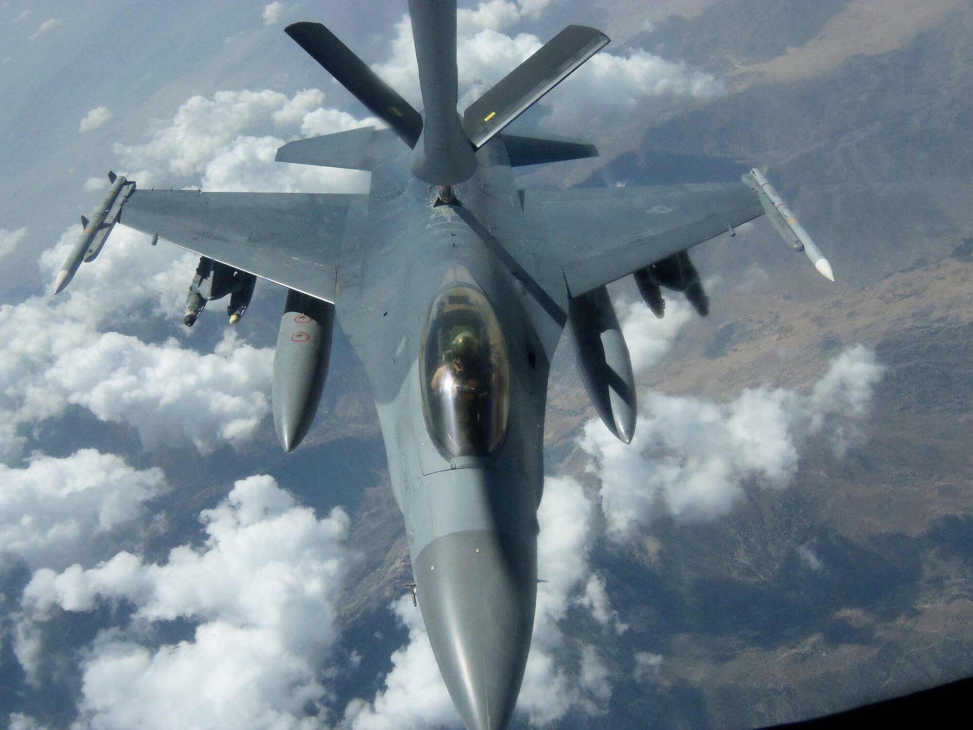 Capt. Daniel Wynn, 56th Operations Support Squadron operations flight commander, prepares to refuel in an F-16 Fighting Falcon during a combat mission over Afghanistan in August 2011. (Courtesy photo)