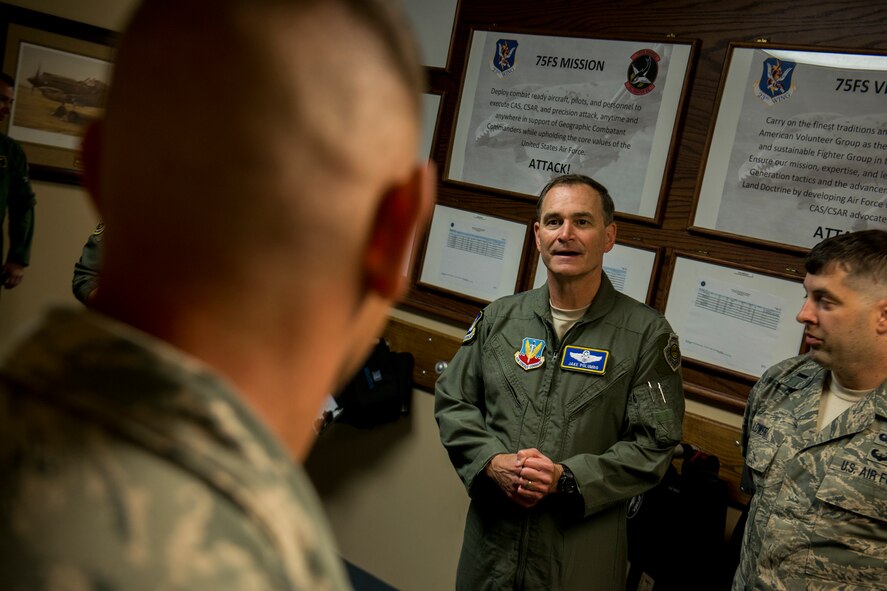 U.S. Air Force Maj. Gen. Jake Polumbo, Ninth Air Force commander, speaks with Lt. Craig Lower (right), 15th Air Support Operations Squadron flight commander, and other 15th ASOS joint terminal attack controllers April 8, 2014, at Moody Air Force Base, Ga. Polumbo spoke with them about the close air support training mission they completed earlier that day and what they have on the horizon for future training opportunities. (U.S. Air Force photo by Staff Sgt. Jamal D. Sutter/Released) 