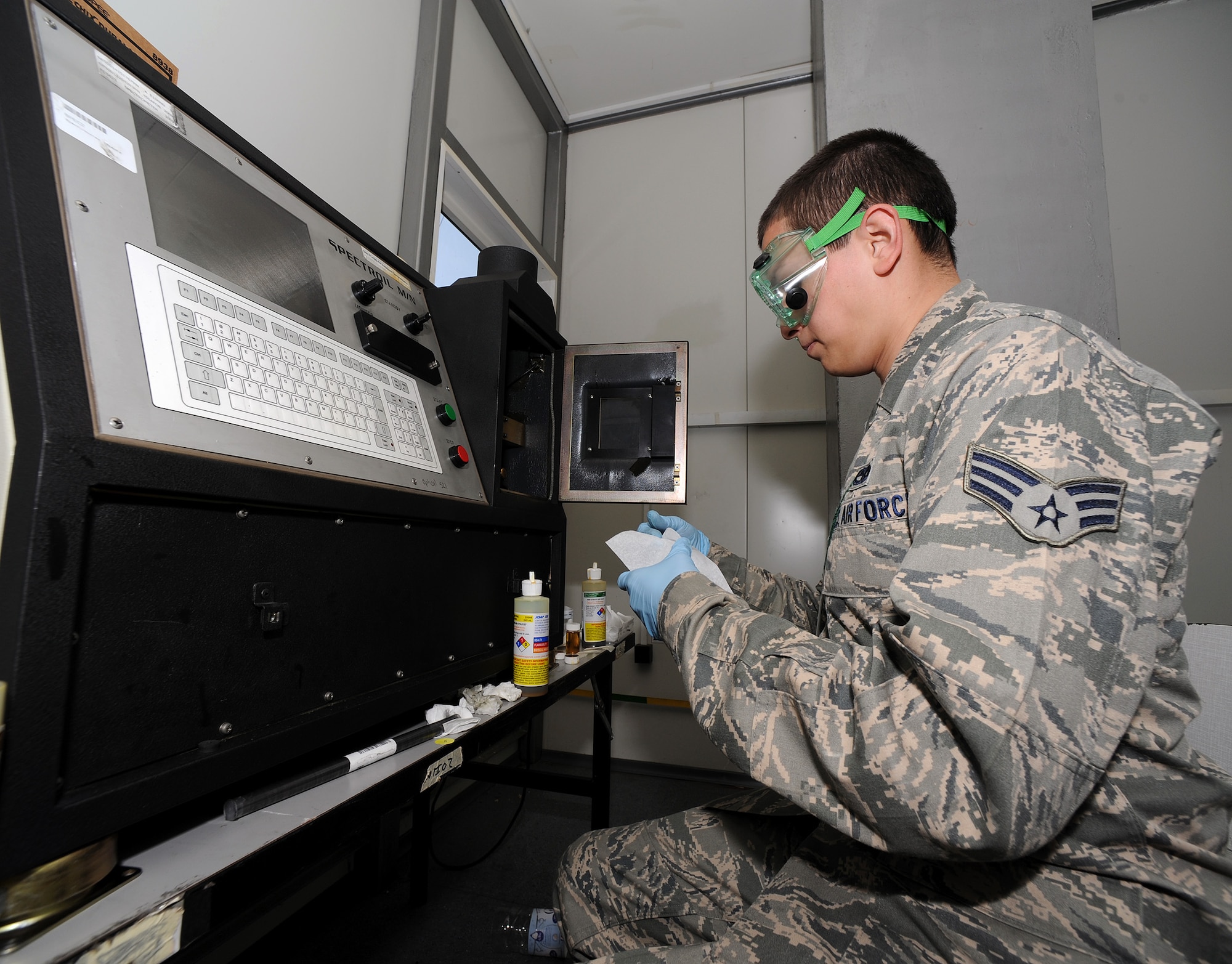 Senior Airman Hector Chacon, 31st Maintenance Squadron non-destructive inspection journeyman, operates a Spectroil oil analysis unit at Campia Turzii, Romania, April 9, 2014. The unit analyzes F-16 Fighting Falcon oil to check for contaminants. (U.S. Air Force photo/Staff Sgt. R.J. Biermann)