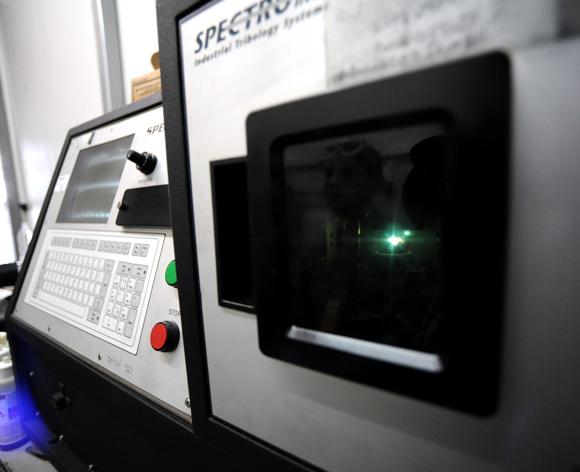 Senior Airman Hector Chacon, 31st Maintenance Squadron non-destructive inspection journeyman, operates a Spectroil oil analysis unit at Campia Turzii, Romania, April 9, 2014. The unit analyzes F-16 Fighting Falcon oil to check for contaminants. (U.S. Air Force photo/Staff Sgt. R.J. Biermann)