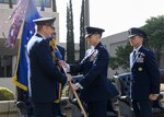 Gen. Robin Rand, left, commander of Air Education and Training Command, presents the unit guidon to Maj. Gen. Bart Iddins, center, during the 59th Medical Wing’s change of command ceremony April 10 at the Wilford Hall Ambulatory Surgical Center, Joint Base San Antonio-Lackland, Texas. Iddins, who was previously Command Surgeon, Headquarters Air Mobility Command, Scott Air Force Base, Ill., replaces a retiring Maj. Gen. Byron Hepburn, right, who led the 59th MDW through its integration with Army medical services as part of the new San Antonio Military Health System. The 59th MDW is comprised of more than 6,000 personnel who provide medical services to nearly 240,000 beneficiaries in the San Antonio metropolitan area. (U.S. Air Force photo/Staff Sgt. Kevin Iinuma)