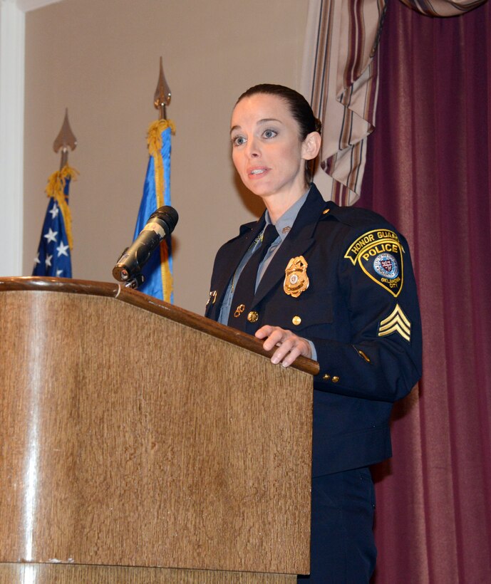 Sergeant Katie Lawson of the Oklahoma City Police Department tells her story of survival to National Prayer Luncheon attendees April 1 at the Tinker Club. In August 2010 while she was patrolling an Oklahoma City neighborhood, a gunman opened fire on her, hitting her six times. After her full recovery, she requested to go back out on the same streets as before the shooting. (Air Force photo by Kelly White)