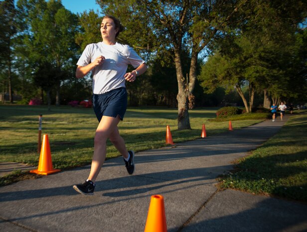 2nd Lt. Elizabeth Johnsen, 628th Logistics Readiness Squadron fuels flight commander, pushes to the finish line during the 5K Fitness Challenge Run Apr. 11, 2014, on Joint Base Charleston – Air Base, S.C. The Fitness Challenge is held monthly to test Team Charleston’s fitness abilities. Johnsen was the top female runner with a time of 21:45. (U.S. Air Force photo/ Airman 1st Class Clayton Cupit)