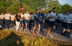 Members of Joint Base Charleston begin the 5K Fitness Challenge Run Apr. 11, 2014, on Joint Base Charleston – Air Base, S.C. The Fitness Challenge is held monthly to test Team Charleston’s fitness abilities. This month's Fitness Challenge raised awareness on sexual assault. (U.S. Air Force photo/ Airman 1st Class Clayton Cupit)
